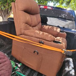 Reclineable couch with remote(semi new) 100$obo