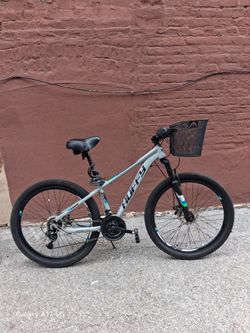 Huffy Mountain Bike. Pneumatic Shocks on front forks. Removable basket 🧺 i. Front. Lock chain included . Best deal in the World. 99$