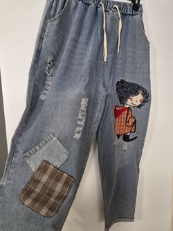 Distressed Denim Jogger Pants with Patches