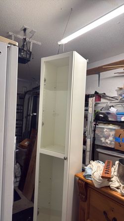 White storage with glass doors