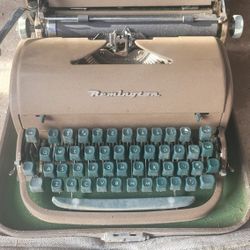 Antique typewriter with case
