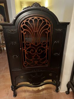 Antique Dark Solid Wood Ornated Cabinet - $350