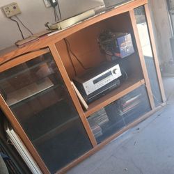 Mid century  entertainment  cabnet  4x5 ft  tv space is 28" /side door