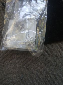 1/10 carat authentic diamond earrings in sterling silver