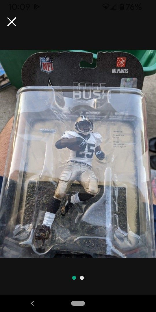 Reggie Bush and Adrian Peterson figurine 