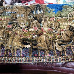 Vintage dogs playing poker tapestry in good condition. A few tassels are missing, but it looks pretty good overall. Would make a great wall hanger for