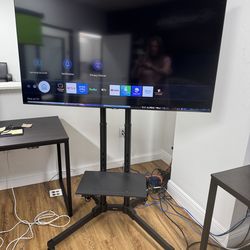 55 “ SAMSUNG SMART TV WITH ROLLING STAND