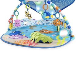 Bright Starts Finding Nemo Mr. Ray Ocean Lights & Music Baby Activity Gym with Tummy Time Pillow, Newborn+