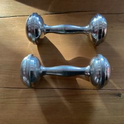 SET OF (2) PEWTER BABY RATTLES.  4” x 2” 