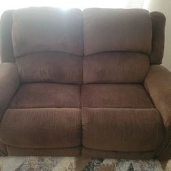 Gently Used Reclining Sofa And Love Seat