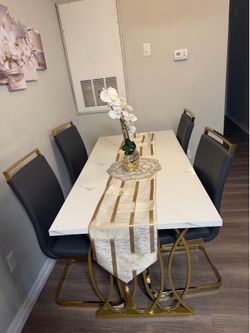 Complete chair set for sale, including the table.