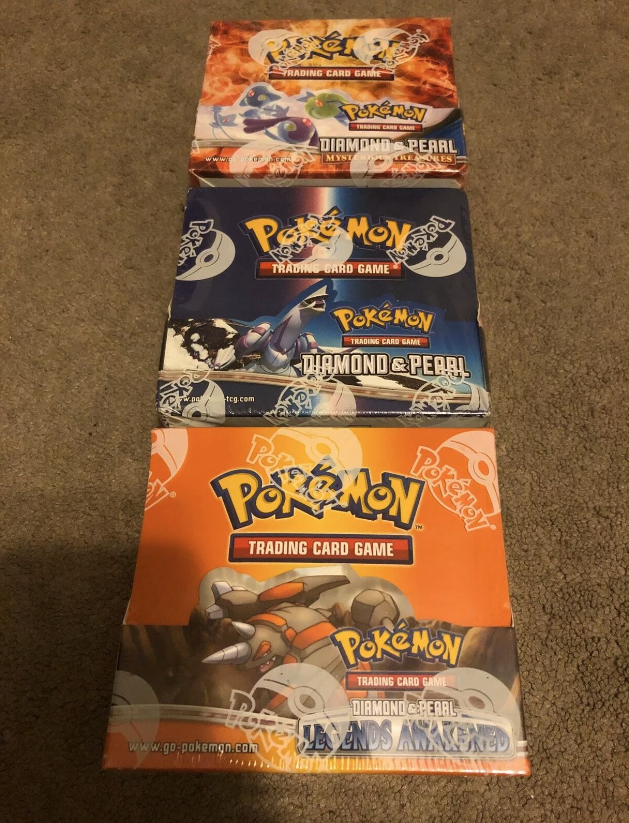 Pokemon cards diamond and Pearl + legends awakened + mysterious treasures booster boxes