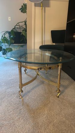 Glass and gold coffee table