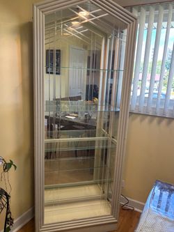 Tall Lighted White Cabinet with Glass Shelves