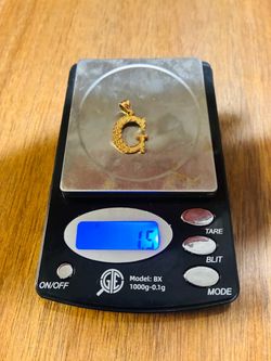 10k gold g pendant