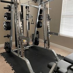 TuffStuff CSM-600 Evolution Smith Machine With Pulley System, Bench and Weights