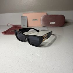Miu miu thicker sunglasses