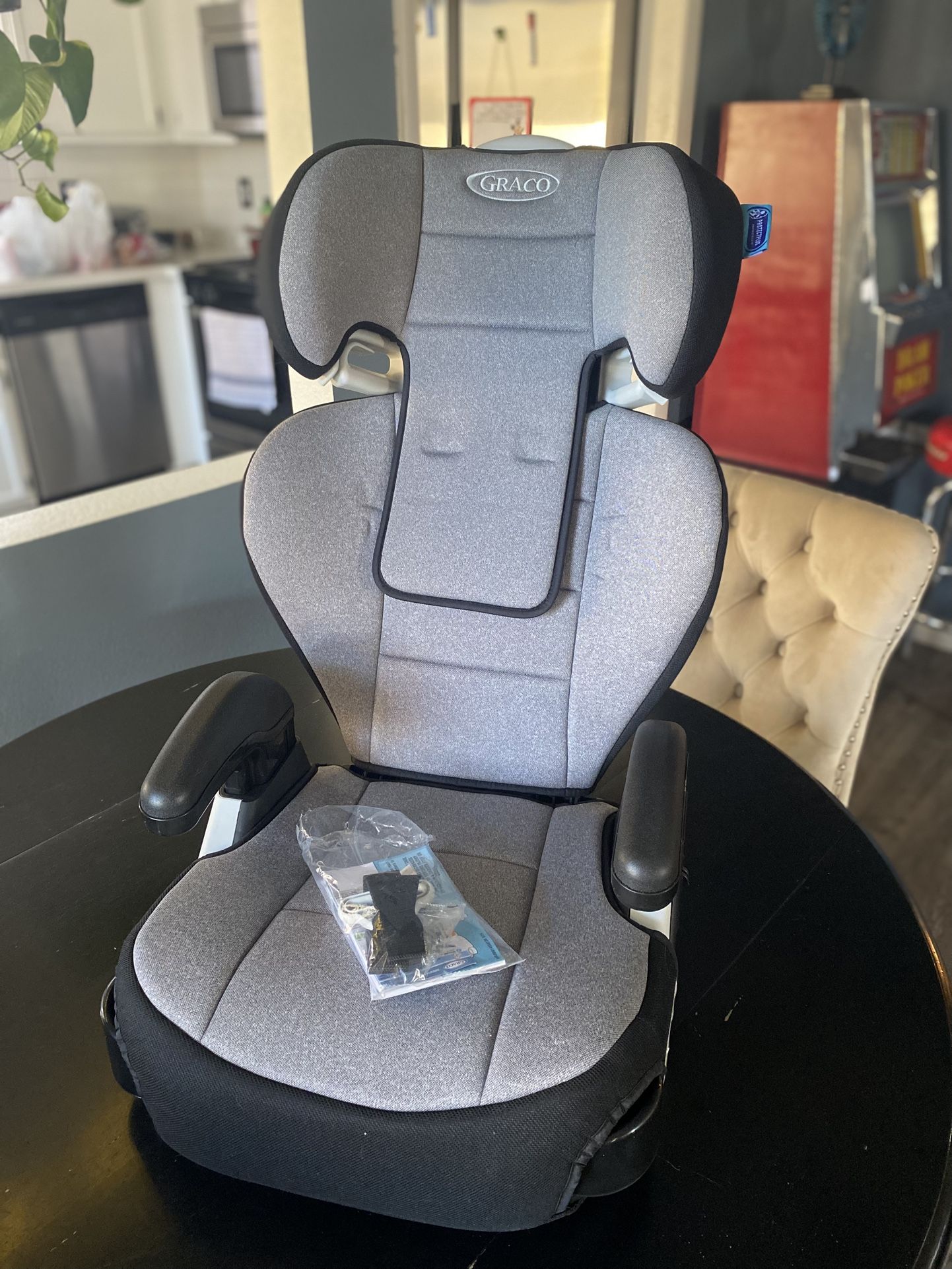 Brand new Graco booster car seat