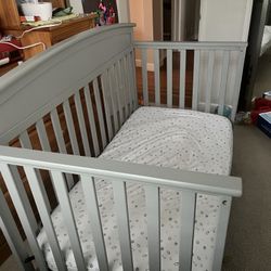 Graco 5-in-1 Convertible Crib with Mattress + Sheets & Protector