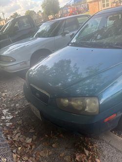 Hyundai Sedan – Teal/Green