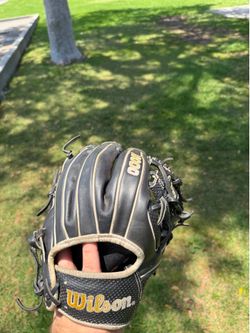 2 baseball bats and an A2000 11.5
