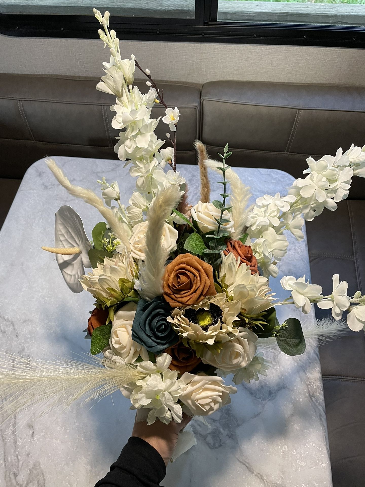 Wedding bridal bouquet made of roses, Dahlias, dragons breath, white sunflowers, pampas….