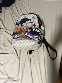 sprayground backpack used spot on the bottom people cant see it if your wearing it