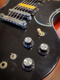 Epiphone with case by Gibson ebony electric guitar black six string with hard case