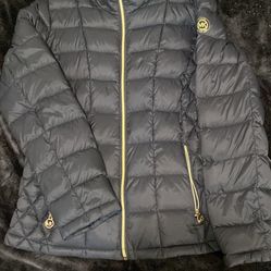 Michael kor’s minimalist puffer