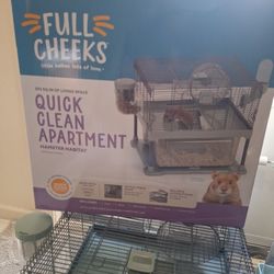 Hamster cage practically new 