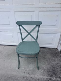 Sage green metal chairs