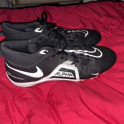 Black Nike football cleats. Size 9 1/2