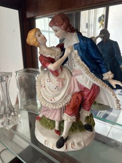 Antique Porcelain Figureine