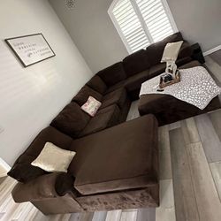 Brown sectional with ottoman 