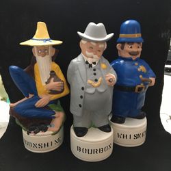 Three 12” Decorative Statues