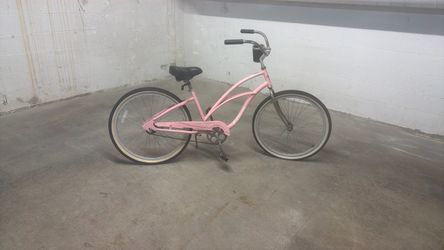two pink electra bikes
