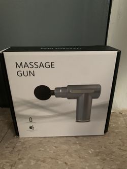 BRAND NEW MASSAGE GUN