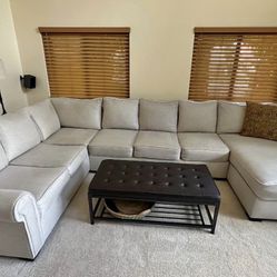 Large Cream Colored Sectional Sofa with Chaise