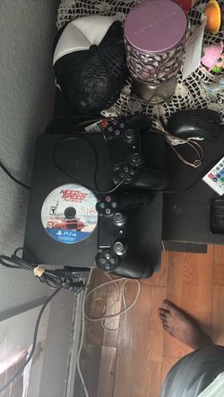 PS4 Console with 2 Controllers and Game