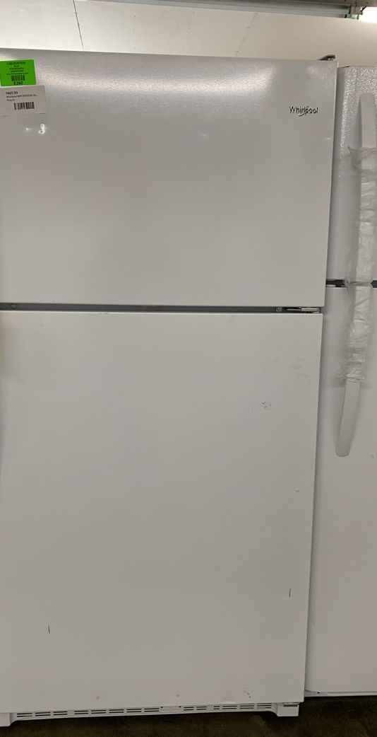 Whirlpool refrigerator!! Top freezer all new!! With warranty 6