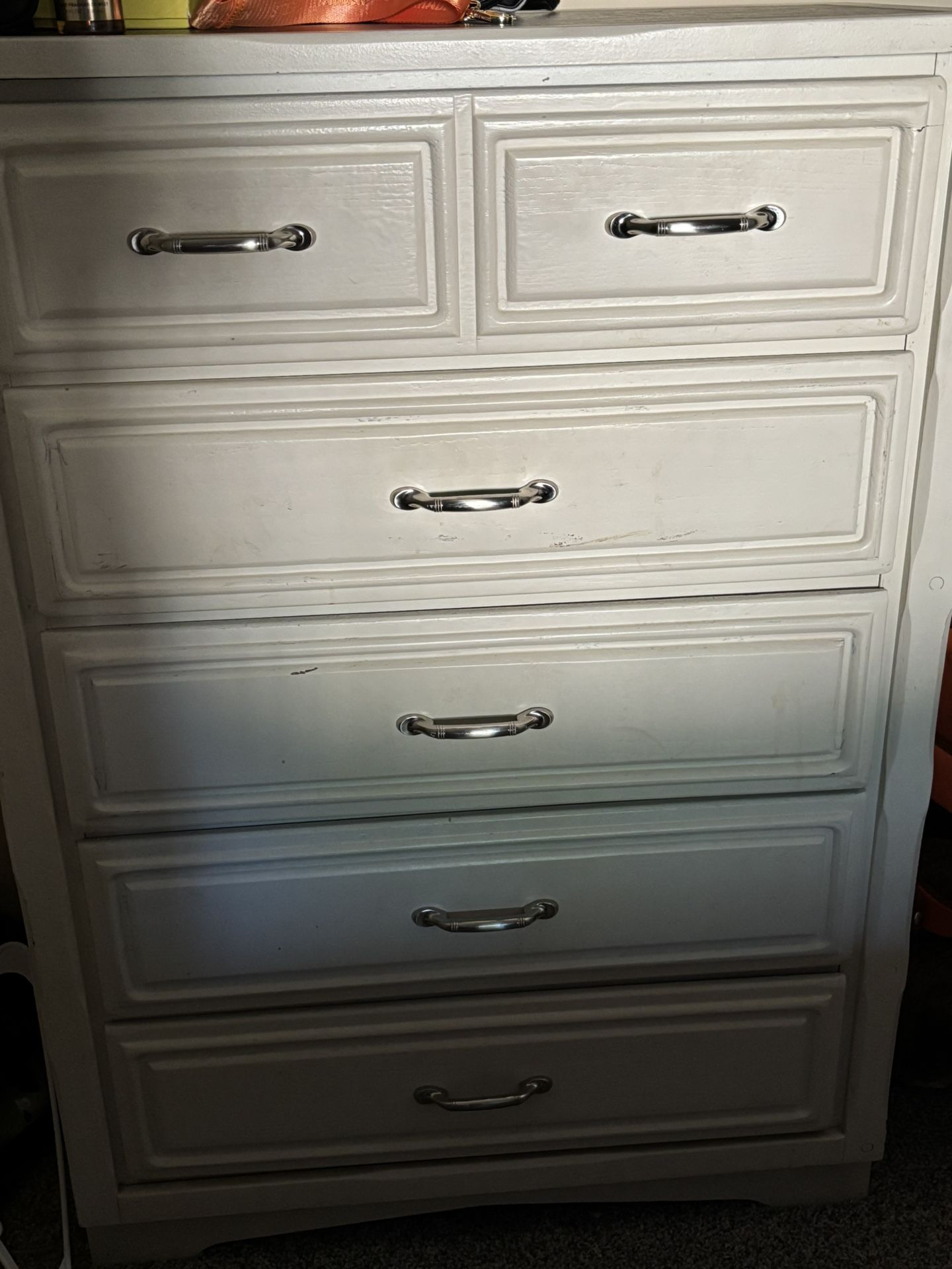 A Dresser And Nightstand