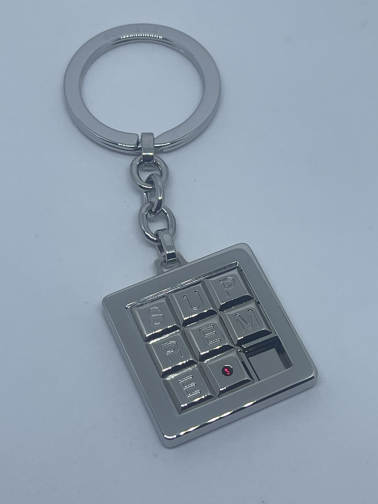 Supreme Puzzle Keychain