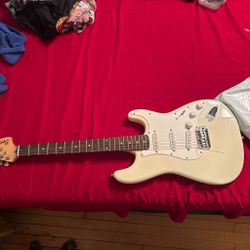 White fender Stratocaster guitar