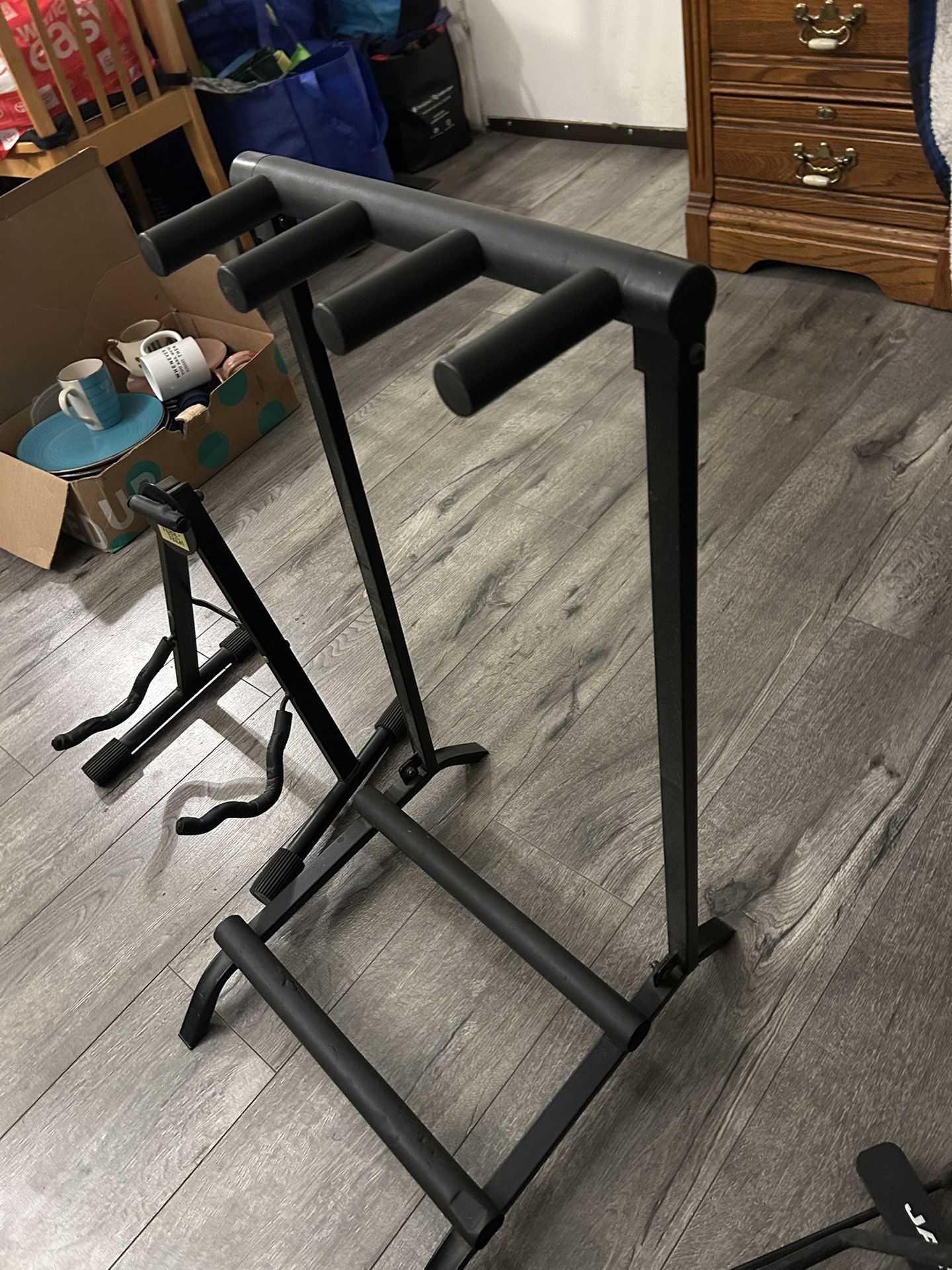 One 3 Guitar Stand And Two Individual Guitar Stands