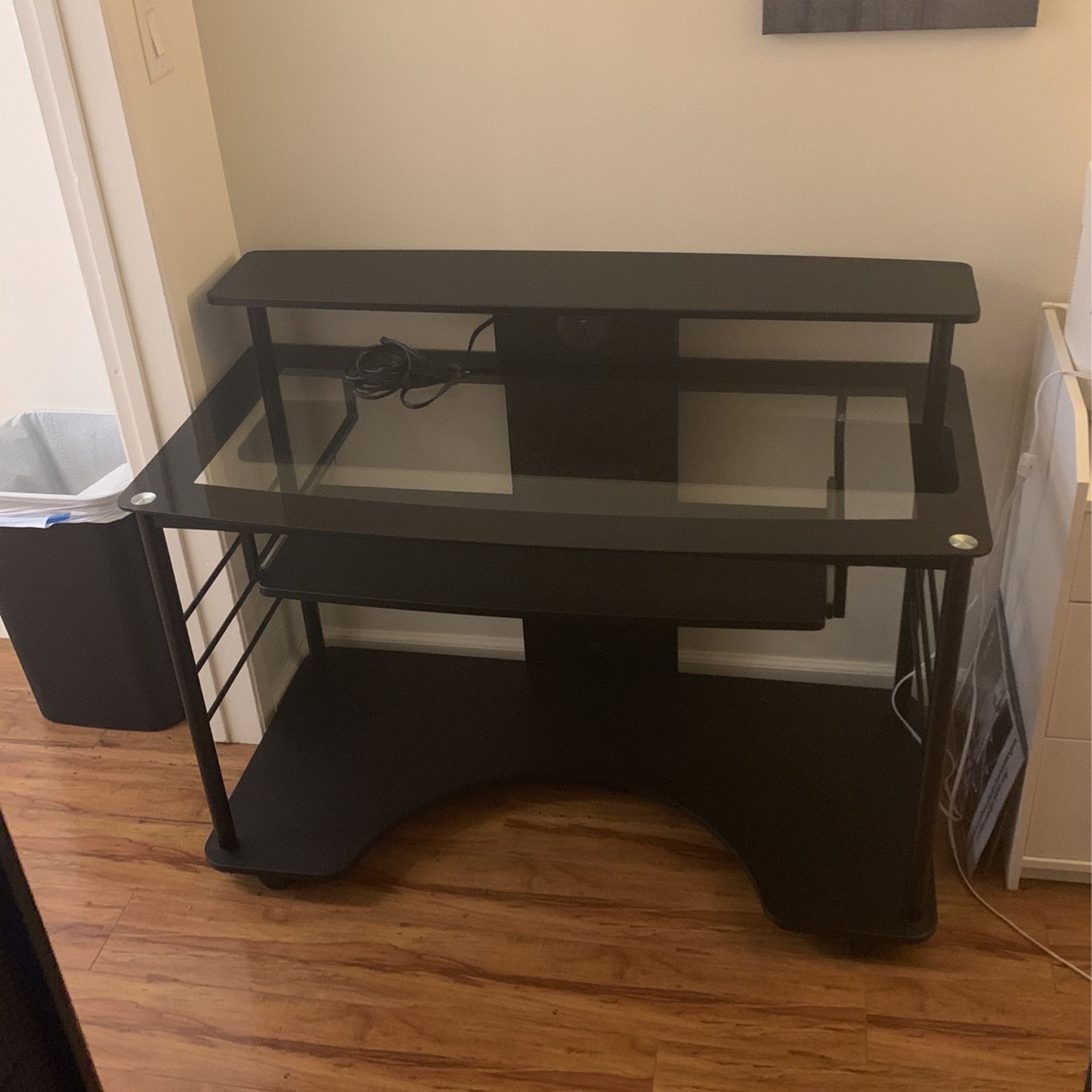 Used Glass Desk With Keyboard Tray And USB Ports (47 x 26)