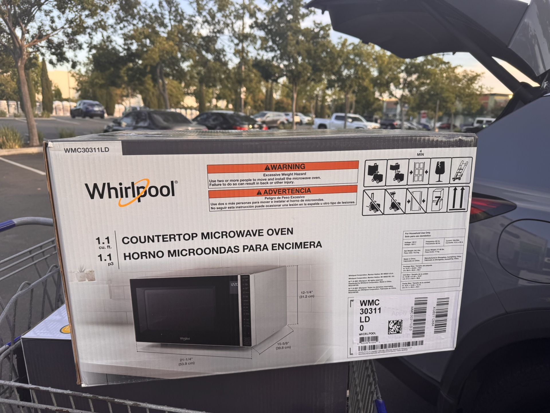 Whirlpool 1.1-cu ft 900-Watt Sensor Countertop Microwave (Silver)