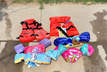 Puddle Jumper: Fabric Life Vest With Armbands  $10-$15