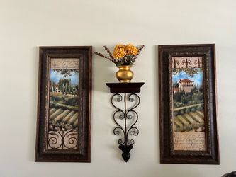 Two pictures and candle holder