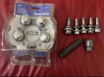 Vovlo S60 Lug Nuts. 5 used and 4 new the package.