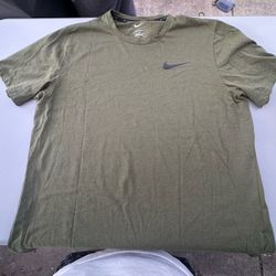 Green Nike Dri-Fit shirt 